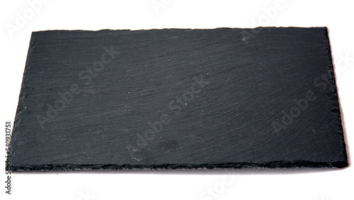 Dark Grey Black Slate Board for Dishes on White Background with Copy Space Natural Light Selective Focus