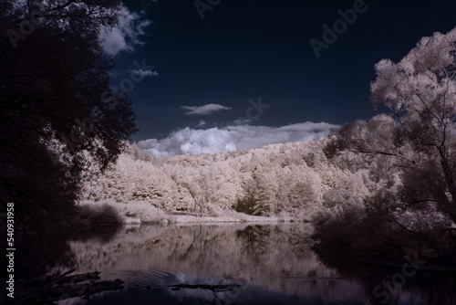 infrared photography - ir photo of landscape under sky with clouds - the art of our world in the infrared spectrum © klickit24