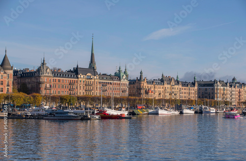 Photography Panorama view, old fishing boats in the bay Ladugårdsviken with offices, apartme