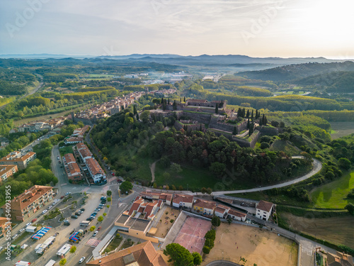 Aerial drone footage of Hostalric European medieval town in the mountains castle Church Cathedral trekking tourism a few minutes from Blanes and the Costa Brava