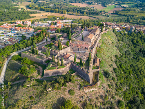Aerial drone footage of Hostalric European medieval town in the mountains castle Church Cathedral trekking tourism a few minutes from Blanes and the Costa Brava