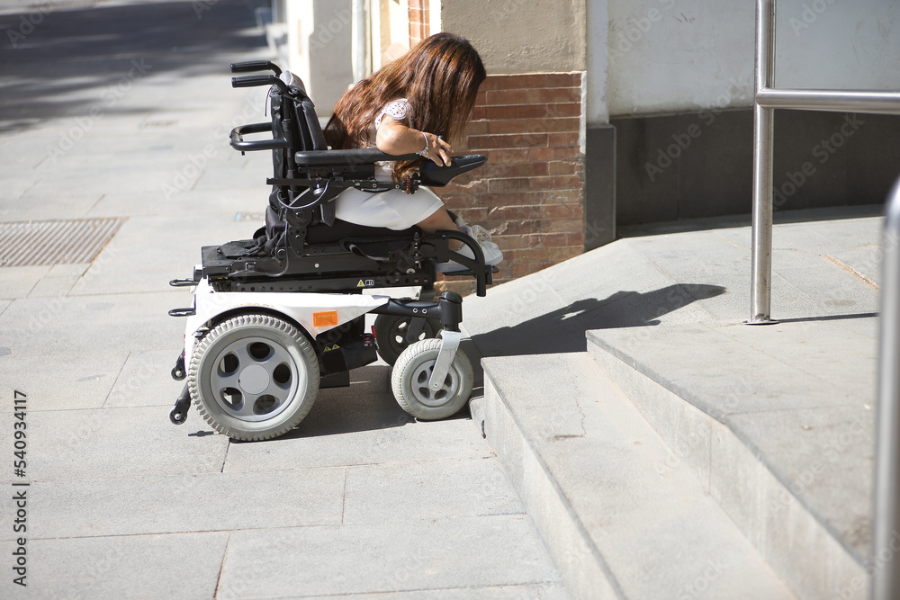 Disabled woman with reduced mobility and small stature in an