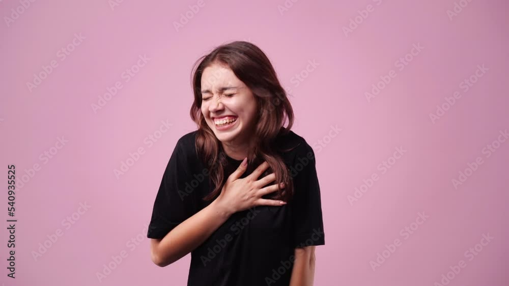 4k video of excited young woman dancing over pink background, 4k video of excited young woman dancing over pink background,