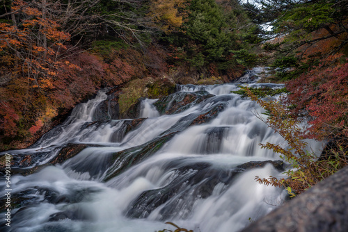 Colorful majestic waterfall in national park forest during autumn nature Photography.Landscape view national nature park Nikko Japan. Beautiful place