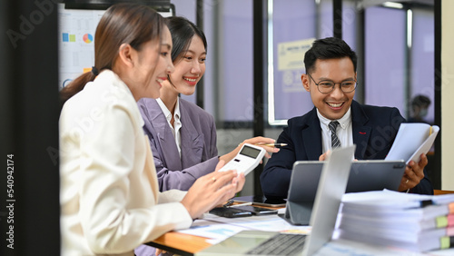 Group of an Asian accountants are in the meeting, working, consulting, discussing