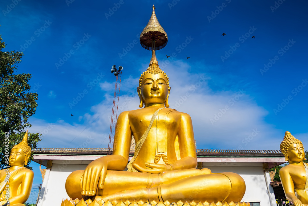 Bangkok, Thailand- September, 18, 2021 : Golden sitting Buddha statue in temple at Bangkok, Thailand Bangkok, Thailand- September, 18, 2021 : Golden sitting Buddha statue in temple at Bangkok, Thailand