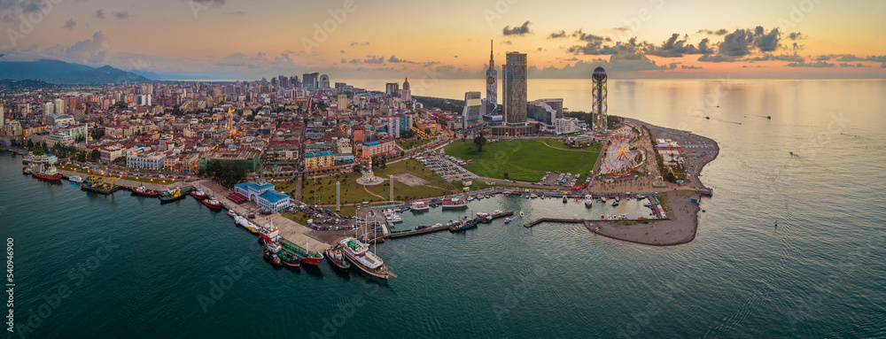 Panoramic drone view of Batumi, Georgia. City center and port at dusk