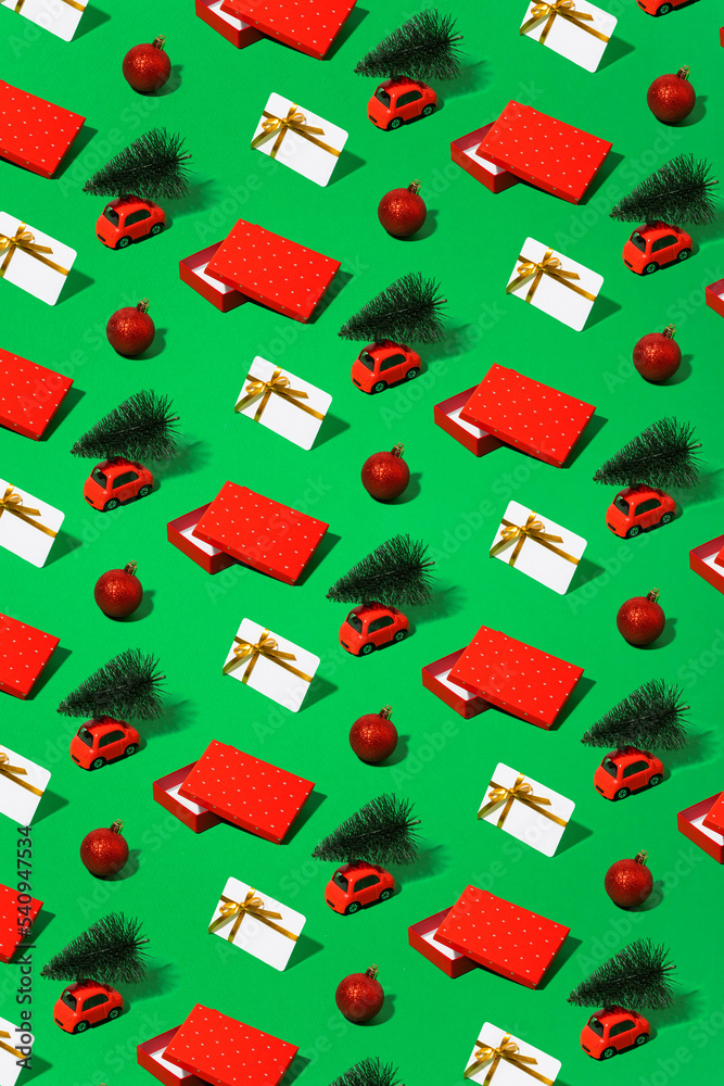 Trendy minimal pattern of various Christmas symbols, cars, gifts, Christmas trees, bonus card, green background.