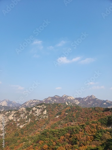 Bukhansan National Park. Bukhansan Bibong Peak - Hyangnobong Peak. autumn mountains. hiking Korean mountains. mountain landscapes in autumn. trekking. rise to the top of the mountain. © MarsiWWW