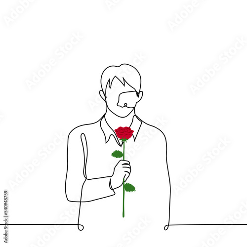 man stands with his head down holding a red rose in front of him - one line drawing vector. concept a delinquent lover asks for forgiveness, a shy admirer gives a flower