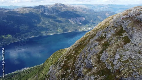 Revealing Hardangerfjord sorfjorden from majestic high altitude mountain hillside above Lofthus Norway - Aerial from Queens hiking trail looking towards Kinsarvik and Utne photo