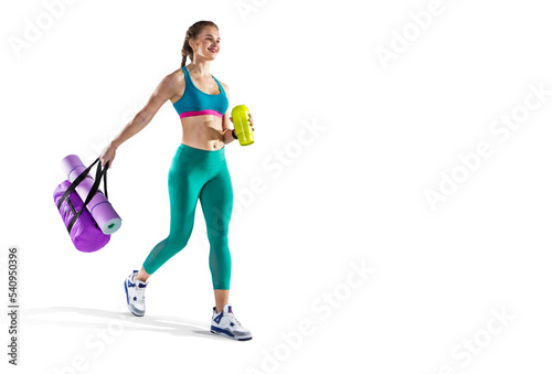Sports transparent background. Beautiful slim sporty young girl is preparing for joint training. © vitaliy_melnik