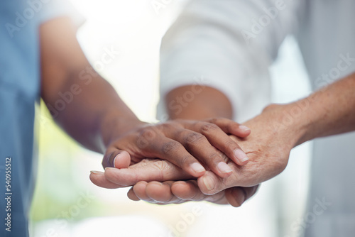 Hands, teamwork and support of doctors in collaboration for mission, goal or team building together. Trust, partnership or medical group with target, motivation or vision, winning or success mindset