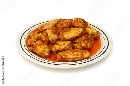 Chicken wings with sauce on white background 