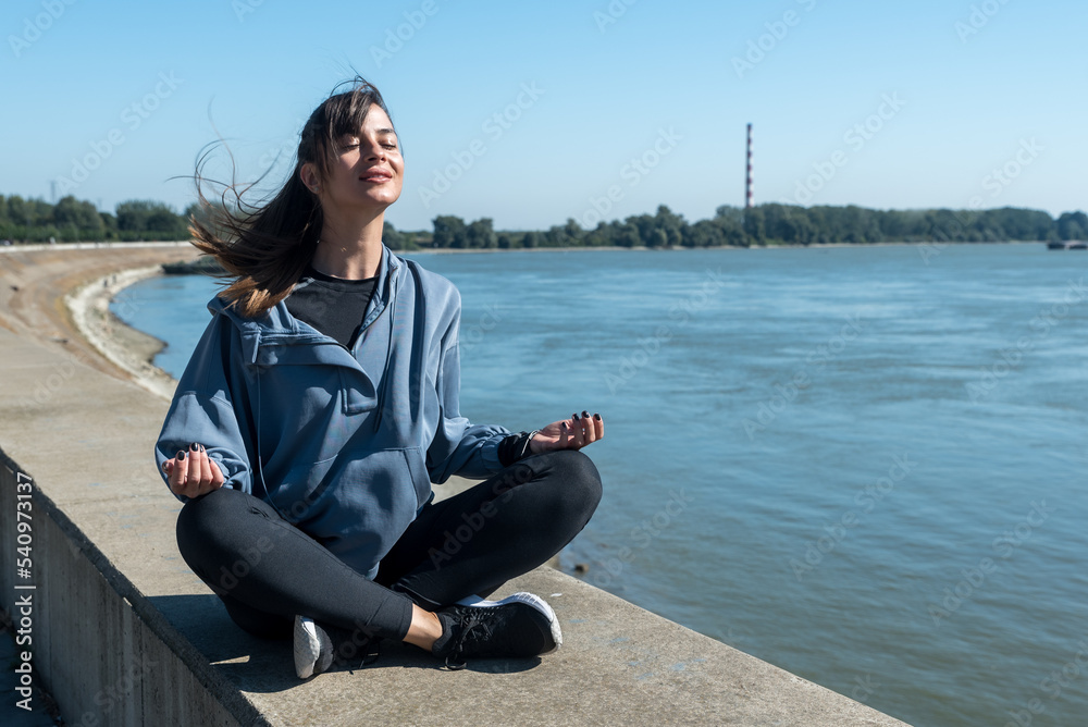Young woman cancer survivor decides to change her way of life after illness and start practicing every morning as new life routine. Female workout training outdoor for health and happiness. Young woman cancer survivor decides to change her way of life after illness and start practicing every morning as new life routine. Female workout training outdoor for health and happiness.