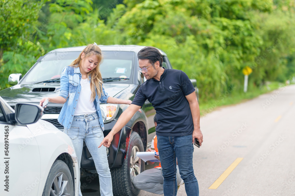 Caucasian Woman Driver Making Phone Call To Insurance Agent After Traffic Accident. Accident. Car insurance an non-life insurance concept. Caucasian Woman Driver Making Phone Call To Insurance Agent After Traffic Accident. Accident. Car insurance an non-life insurance concept.