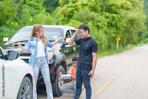 Caucasian Woman Driver Making Phone Call To Insurance Agent After Traffic Accident. Accident. Car insurance an non-life insurance concept. © ND STOCK