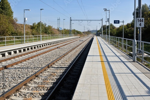 Railway tracks and small railway station near city Brno, Czech Republic