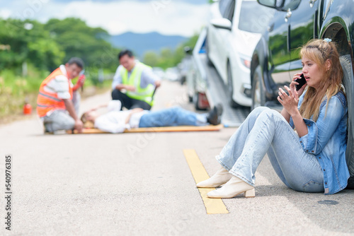 Wallpaper Mural An injured woman in a plastic stretcher after a car accident ,Car accident insurance concept Torontodigital.ca