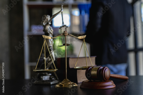 Judge's hammer, scales, god of justice Law in the Lawyer's Office