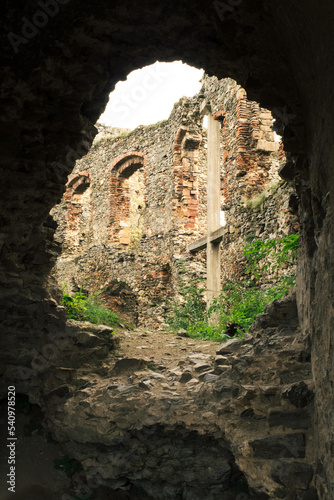 Ruins of medieval mountain Romanian castle Şoimoş Fortress (Cetatea Soimos Lipova Arad Romania) and valley of river Mureš