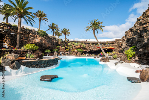 Amazing cave  pool  natural auditorium  salty lake designed by Cesar Manrique in volcanic tunnel called Jameos del Agua in Lanzarote  Spain