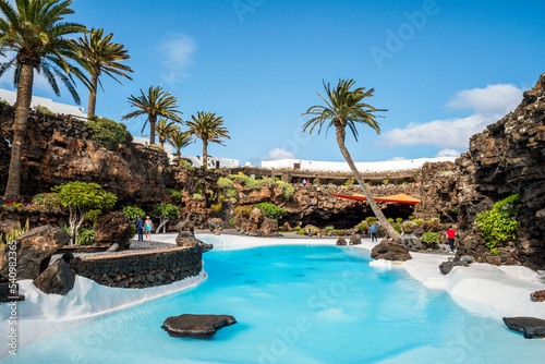 Amazing cave  pool  natural auditorium  salty lake designed by Cesar Manrique in volcanic tunnel called Jameos del Agua in Lanzarote  Spain