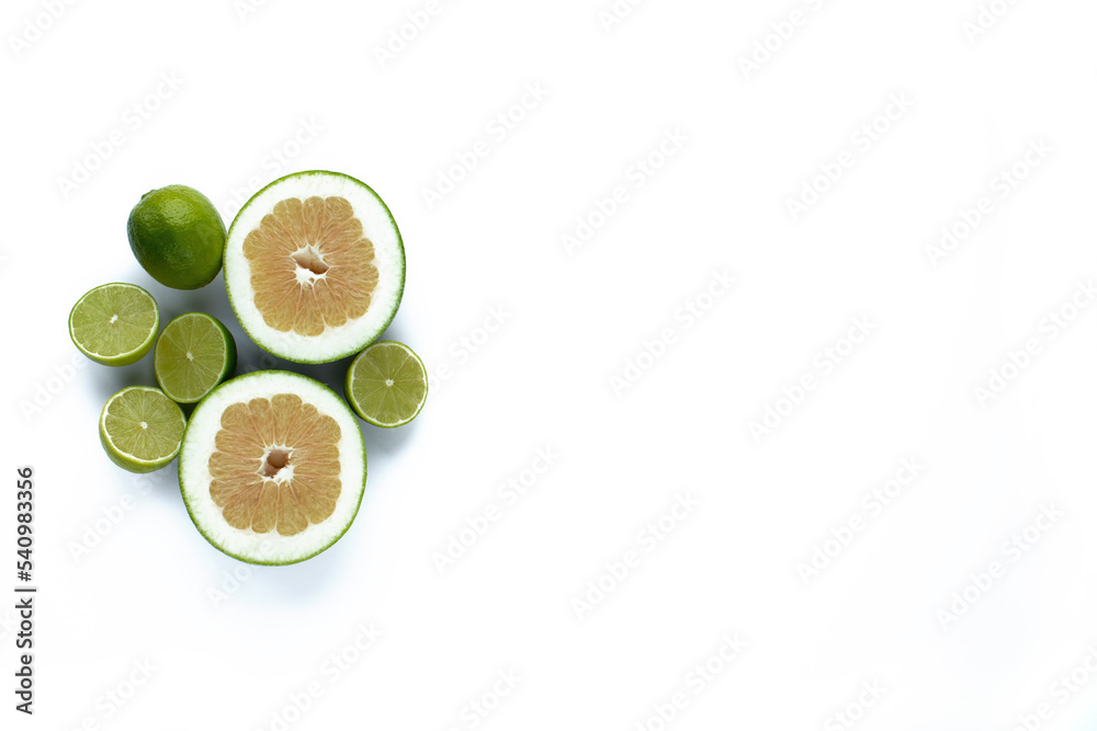 lime and grapefruit on a white background