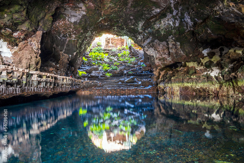 Amazing cave  pool  natural auditorium  salty lake designed by Cesar Manrique in volcanic tunnel called Jameos del Agua in Lanzarote  Spain