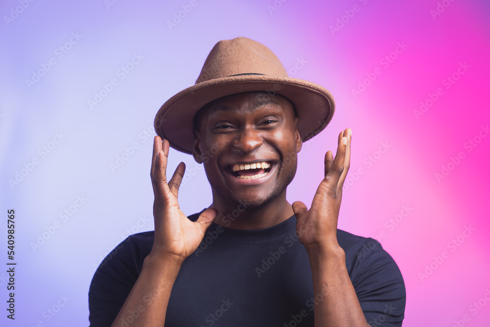 Excited diversity male african american exclaims in happiness expect to receive pleasant surprise gestures actively, expresses great surprising on pink background Excited diversity male african american exclaims in happiness expect to receive pleasant surprise gestures actively, expresses great surprising on pink background