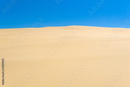 desert landscape  sand dunes under blue sky