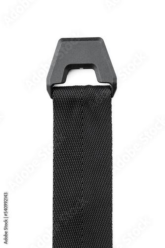 Black plastic fastener fastex for the manufacture of backpacks. Plastic belt clip, carbine - buckle, length adjusters on bag or backpack strap. Fastex buckle on textile belt on white background. photo