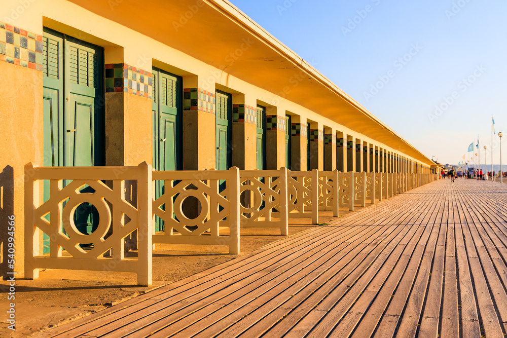Deauville seaside resort. Normandy, France. Promenade des Planches(Boardwalk).