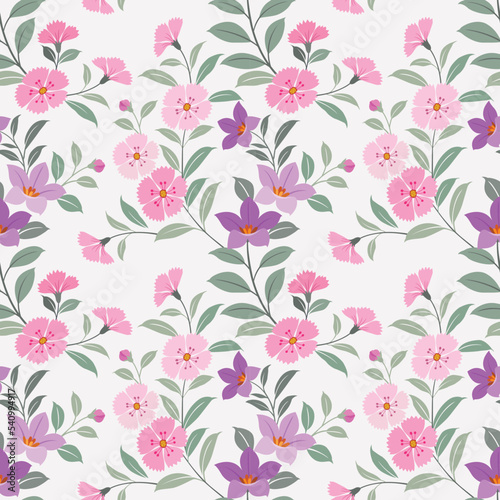 Cute and sweet color flowers seamless pattern. This pattern can be use for fabric textile wallpaper gift wrap paper. © teerawat