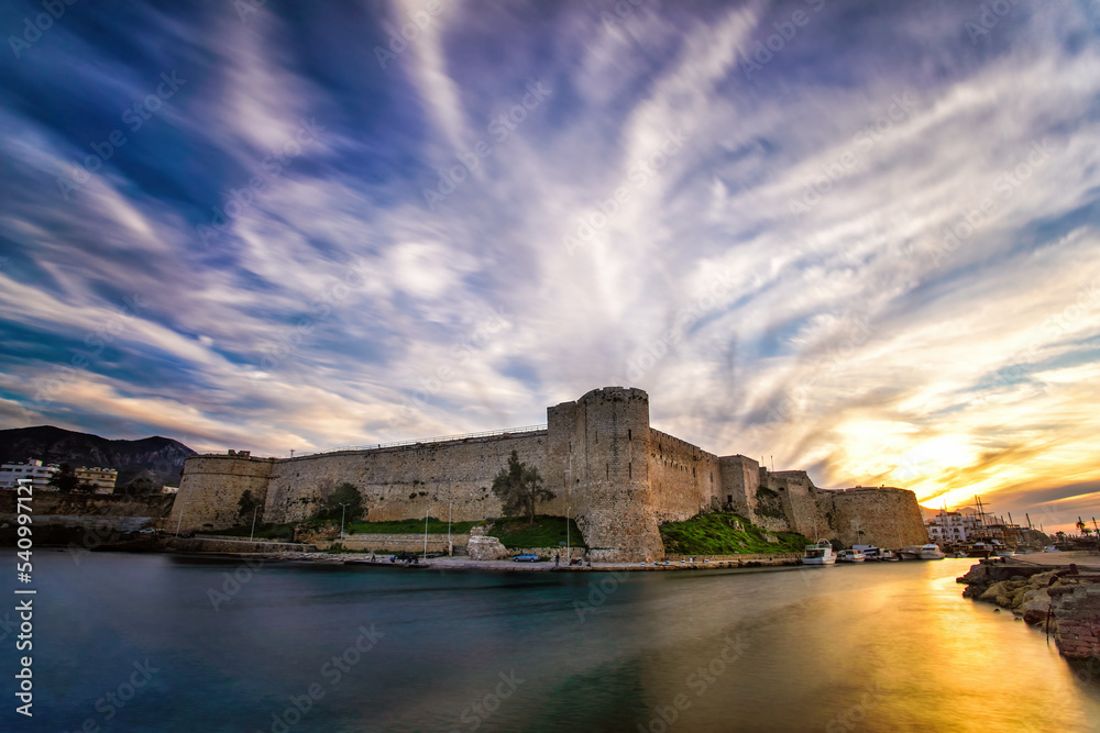 Cyprus, Kyrenia castle and magnificent clouds, sunset over the castle