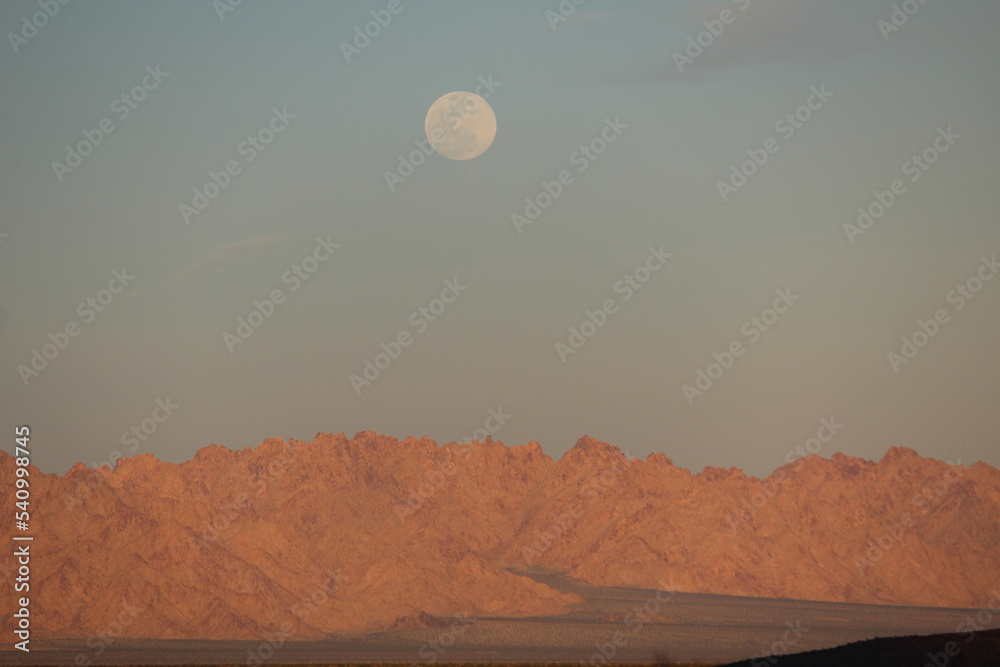 scenic view of mountain against sky during sunset scenic view of mountain against sky during sunset