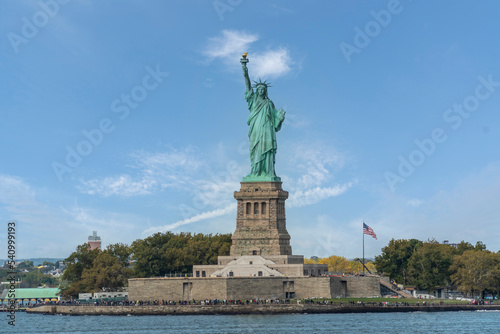  Statue of Liberty with New York Skyline Backdrop © Supavadee