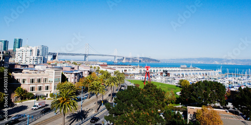 Scenic view of the Embarcadero, piers, and the San Francisco Bay Bridge. photo