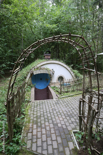 Hobbitland. Little hobbit home in fall forest. Autumn nature, landscape. Hobbit house. Hobbiton, Hobbitland hotel in Moscow region, Russia. Rural recreation. Countryside rest outdoor. Cute hobbit home