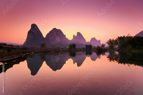 Karst mountains relfected, Li Jang River, Yangshuo, Guilin, Guangxi region, China photo