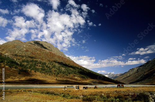 Hiking accross the Atlai Mountains, Tavanbogd National Park, Mongolia. photo