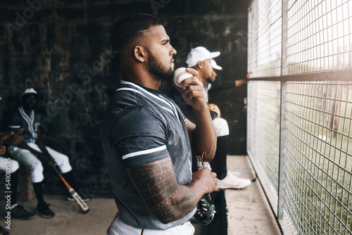 Photos Baseball, man and watching game with a ball in a sports dugout with his team in club uniform
