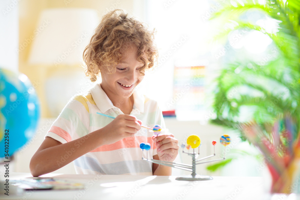 Child with solar system model. Kids planetarium. Child with solar system model. Kids planetarium.