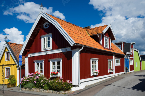 Colorful wooden houses in Bjorkholmen, the oldest district of Karlskrona, Sweden © Mariusz Świtulski