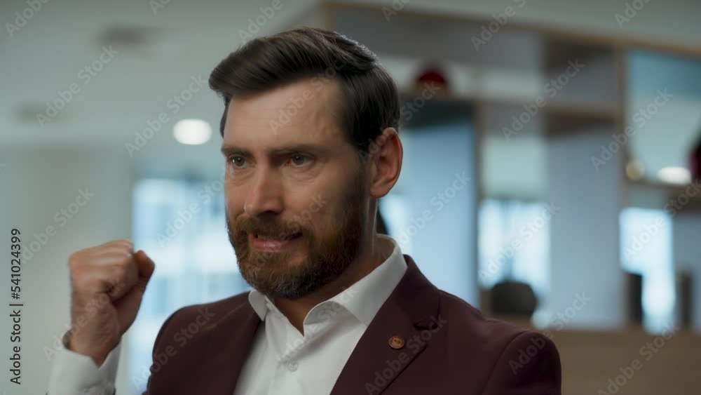 Stressed man putting tablet aside at lobby workplace. Manager having problems Stressed man putting tablet aside at lobby workplace. Manager having problems