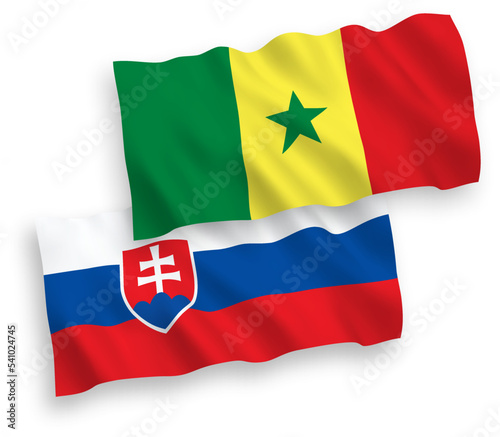 National vector fabric wave flags of Slovakia and Republic of Senegal isolated on white background. 1 to 2 proportion.