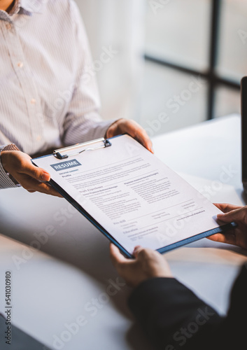 Portrait of a person interviewing for a job and.Submit resume to staff job application concept