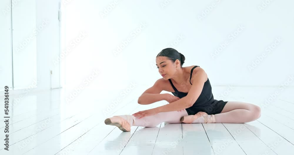 Ballet, dancer and dance stretch of a ballerina woman from India ready for dancing in a studio. Stretching happy person about to start creative training, exercise and workout in a elegant white room Ballet, dancer and dance stretch of a ballerina woman from India ready for dancing in a studio. Stretching happy person about to start creative training, exercise and workout in a elegant white room