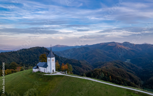 The Church of St. Primož and Felicijan, Jamnik, Slovenia, sunset drone photo