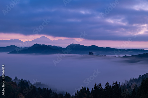 Cerkev Sveti Tomaž (St. Thomas Church) near Škofja Loka, Slovenia. Misty morning and sunrise